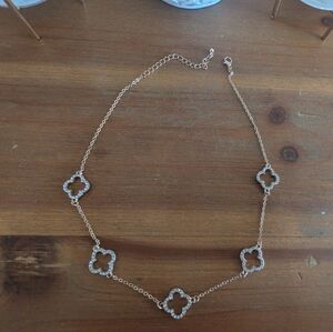 Elegant Gold and Silver Clover Necklace